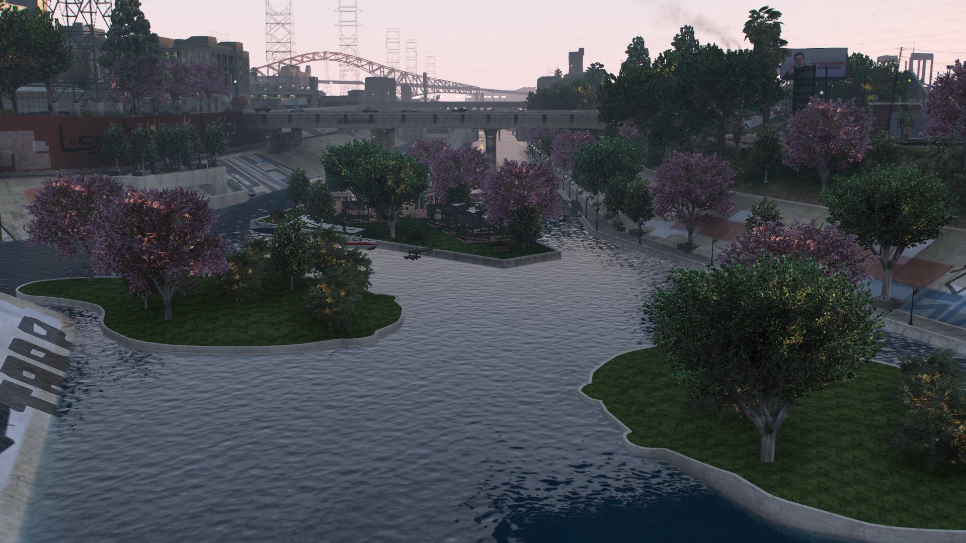 Rivière et pont au milieu de la verdure