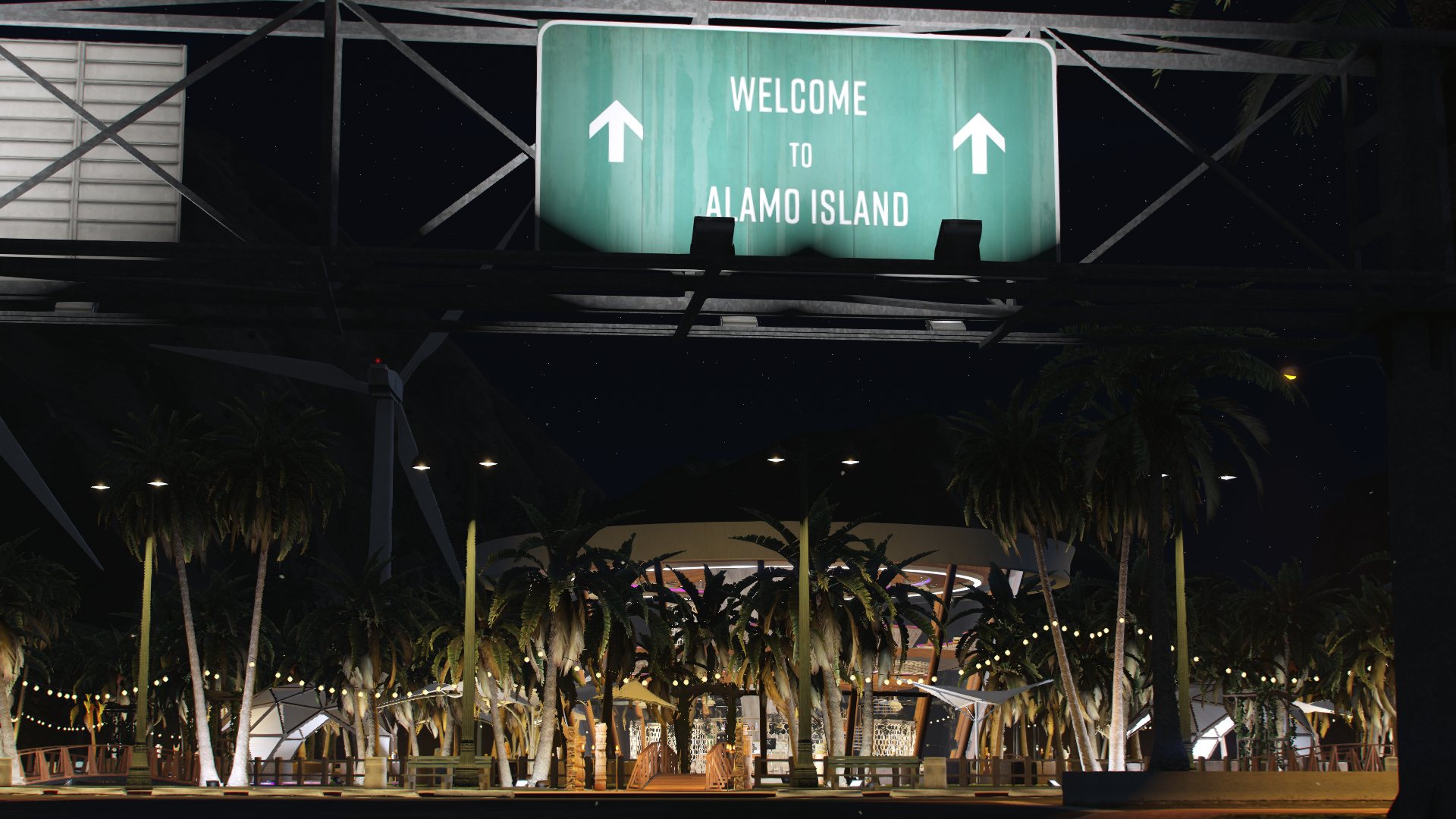 Entrée illuminée « Welcome to Alamo Island », de nuit